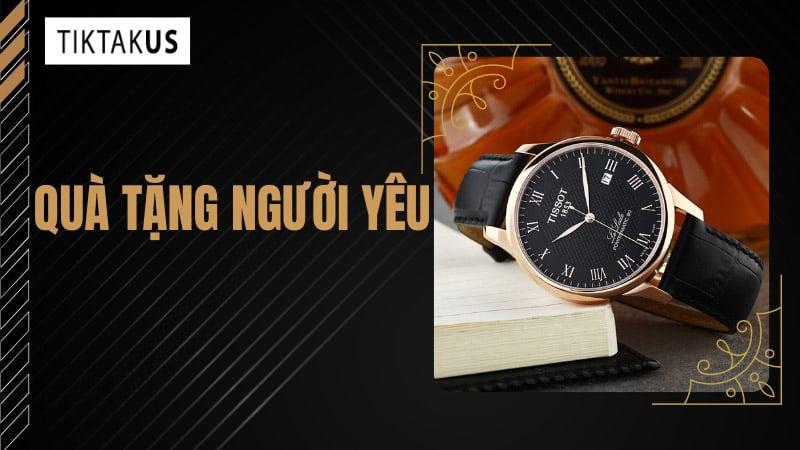 Món quà Giáng sinh ý nghĩa thể hiện sự quan tâm và thấu hiểu dành cho bạn gái, với chiếc hộp quà được gói tinh tế trên nền gỗ ấm